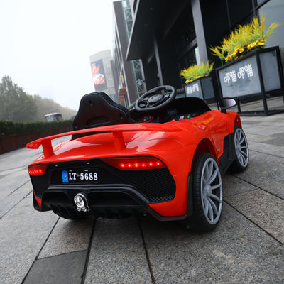 380*2 Motor 2,4 g RC Elektroauto mit Türöffnung und 4 RADEN Fahrt für Kinder im Alter von 2-10 Jahren