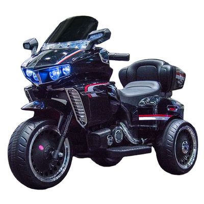 Plastikkinder fahren auf Mini-Motorrad mit Frühschulfunktion und englischer Geschichte