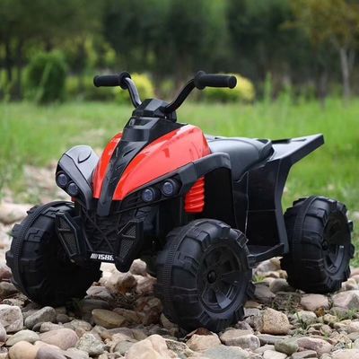 Kinder fahren mit dem ATV mit Musik und Licht